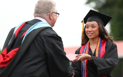 Nicole Allen of South Point High School receives her diploma from principal Gary Ford. Nicole Allen of South Point High School receives her diploma from principal Gary Ford.
