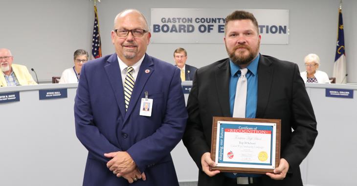 Forestview High School assistant principal James Hilburn pictured with Board Chairman Jeff Ramsey.